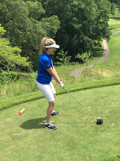 Photo of a legal professional playing golf