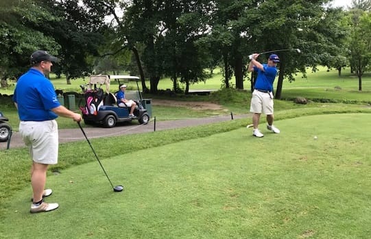 Photo of the firm's legal professionals playing golf