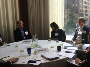Eric Orenstein with the NYC professionls in a round table discussion on EB-5 program