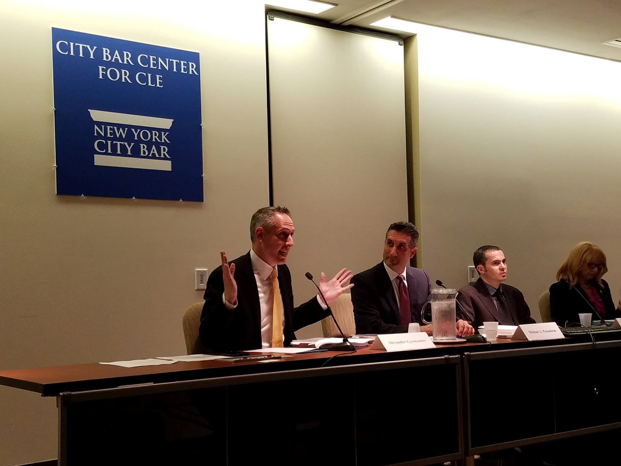 Photo of Alex Lycoyannis along with other panelists CLE panel discussion entitled “AirBnB Under Siege